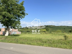 Teren intravilan 717 mp Șura Mare Sibiu, fnt 24 ml, la șosea, ideal casă sau hală|en
